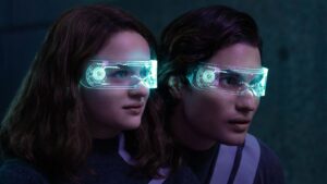 Two characters from Uglies wearing advanced technology glasses, showcasing the futuristic tech elements of the film.