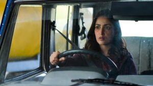 Actress driving a jeep in a tense scene from the movie Article 370.