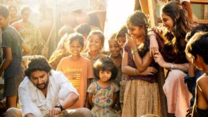 Saripodhaa Sanivaaram interacting with children in a heartwarming community setting.