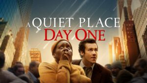 Promotional movie poster for 'A Quiet Place: Day One' featuring a man and a woman looking up anxiously at a skyline, with the movie title in bold letters at the top.