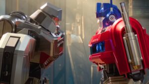 Face-off between Optimus Prime and Megatron in Transformers One, highlighting the iconic rivalry in this animated prequel.